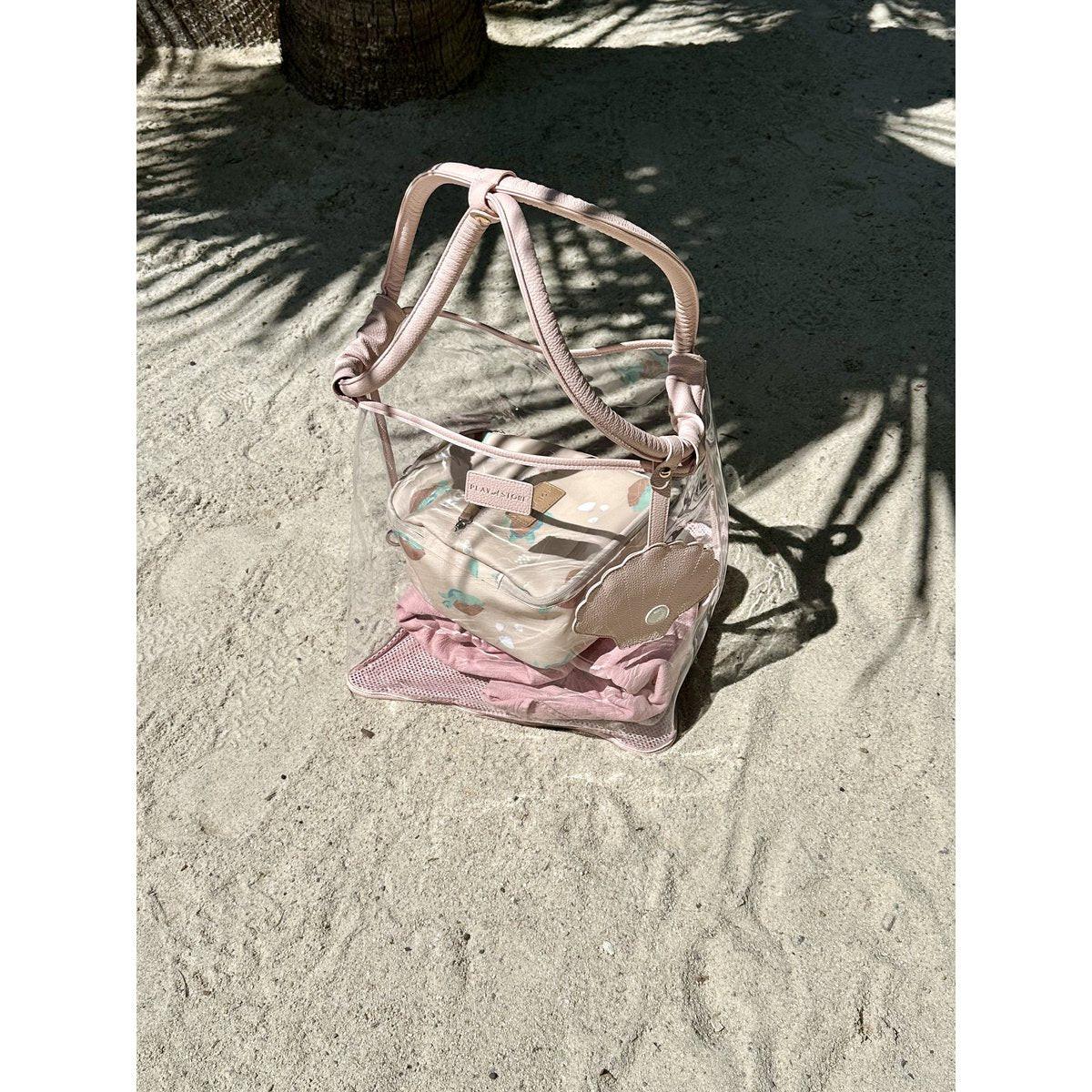 Play & Store Strandtasche – große transparente Badetasche mit Netzboden.